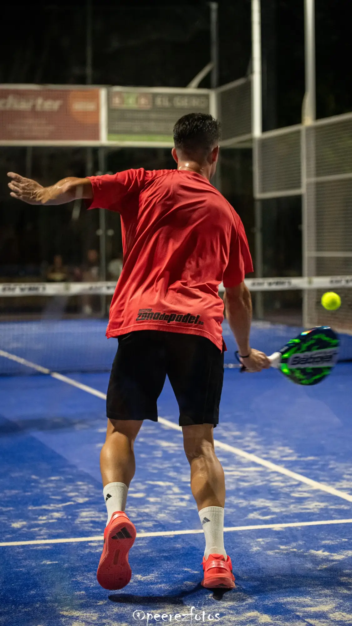 Player moving into position on the padel court